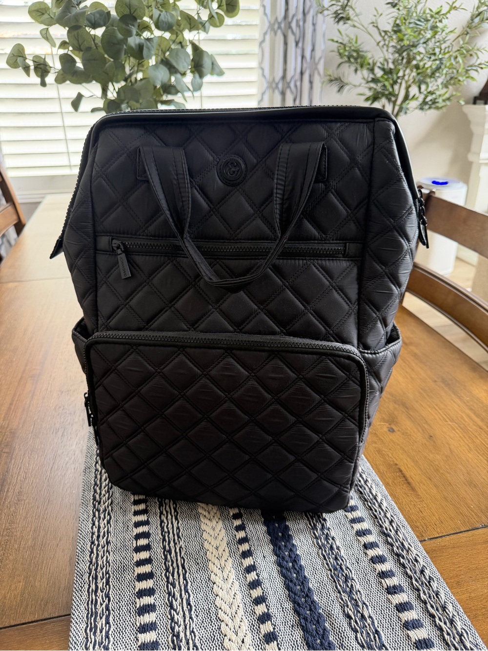 Joan & David Black Backpack